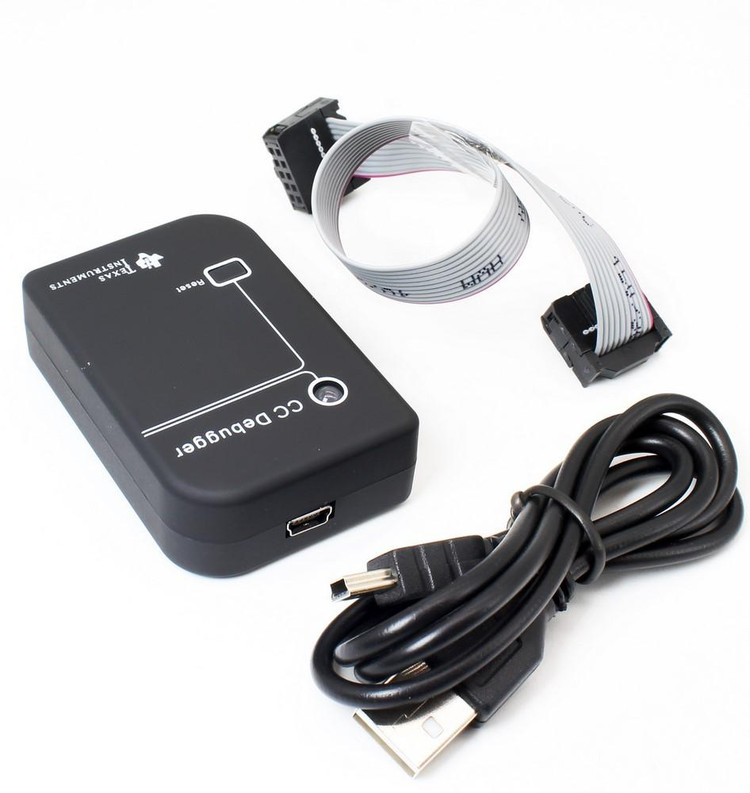 alt="پروگرامر CC Debugger اورجینال TI با اتصال USB و LEDهای وضعیت"